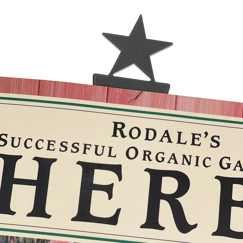 Star Bookmark -Textured clipped onto a book page, showcasing its decorative star top and sturdy design for home or office use.