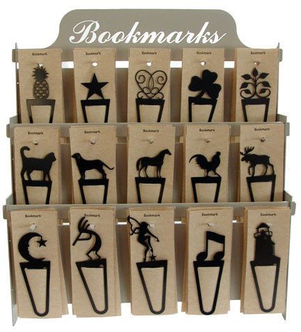Bookmark Assort. - Assortment of 10 features metal bookmarks in various shapes like stars, animals, and music notes. Ideal for book lovers and collectors.