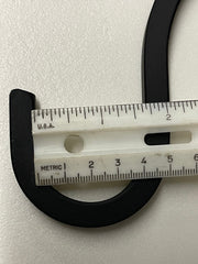 Detailed view of hook end of 56"H Lawn Hook - 3/8" Solid Square Iron with ruler showing width, perfect for hanging planters.