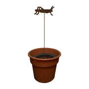 Rusted garden stake with insect decor placed in a flower pot. Perfect for enhancing garden aesthetics with durable metal craftsmanship.