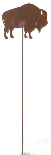 Rusted metal buffalo garden stake with a long rod, perfect for adding western charm to garden beds or outdoor landscapes.