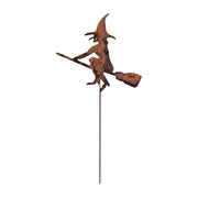 Witch garden stake with broom in rusted metal finish, measuring 11 1/2 in. W x 30-35 in. H, ideal for Halloween yard decoration.