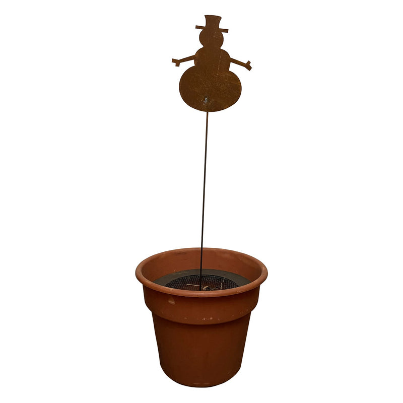 Snowman - Rusted Garden Stake displayed in a planter pot, perfect for festive lawn ornaments and seasonal garden sculptures.