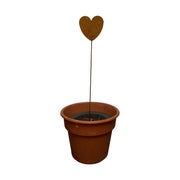 Heart design rusted garden stake displayed in a flower pot, perfect for enhancing patio or garden decor with rustic style.