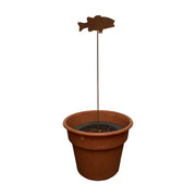 Rusted fish garden stake displayed in a terracotta pot, great for adding character to patios, gardens, or planters.