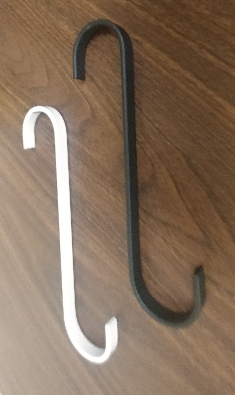 Comparison of S Hook 7 Inch WHITE and black variant on wooden surface, highlighting color options for utility and storage hook needs.