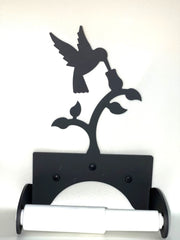 Wall-mounted Hummingbird Toilet Tissue Holder and Roll in black metal with nature-inspired design, stylish addition to bathroom accessories.