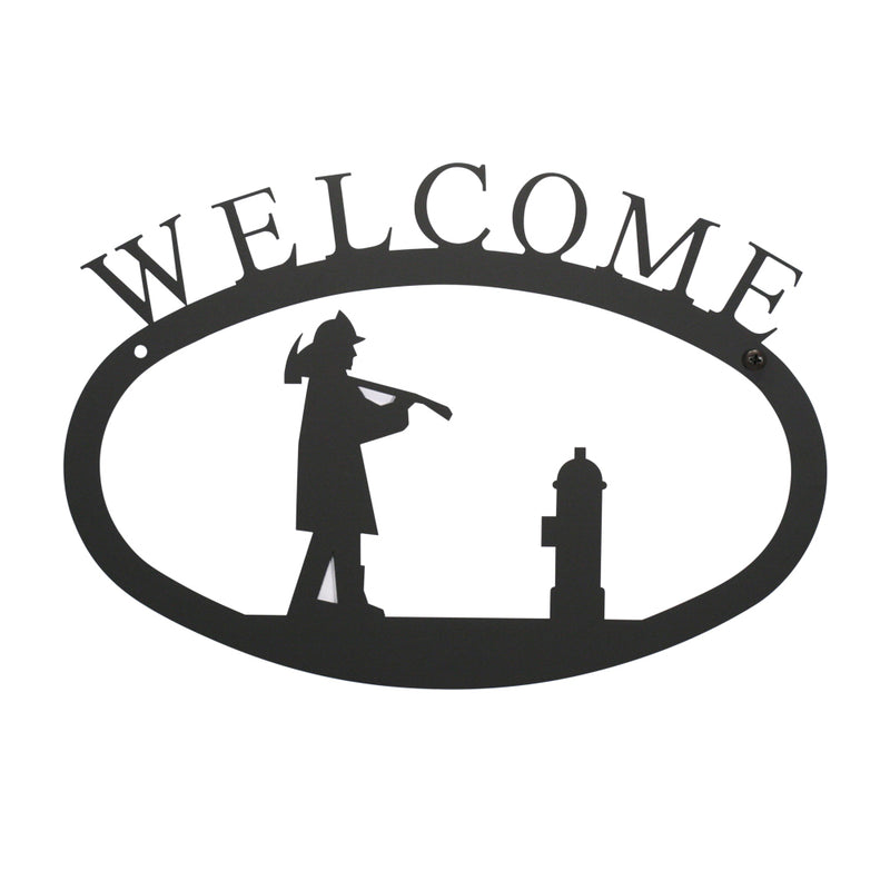 Large firefighter welcome sign in black metal with silhouette of fireman and hydrant, measuring 17.5 x 12.5 inches for home wall décor.
