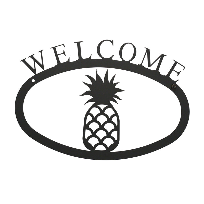 Large Pineapple Welcome Sign in black metal with cutout design, measuring 17 1/2 x 12 1/2, ideal for home entry decor and wall display.