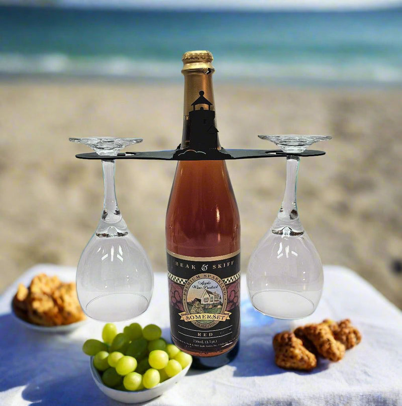 Lighthouse Wine Caddy displayed on a beach picnic setup with wine and snacks, perfect for outdoor entertaining and wine presentation.