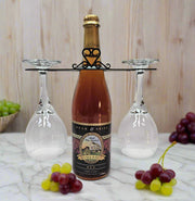 Heart Wine Holder - Sleek Duo Caddy displayed with wine glasses and bottle on a wooden surface with grapes, ideal for home wine storage.