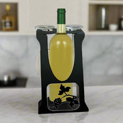 Wine Glass Holder - Grapevine Design with 2 glass capacity and bottle slot, displayed on a kitchen countertop. Elegant black metal wine rack.