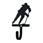 Small black wall hook shaped like a female hockey player silhouette, ideal for organizing items in sports-themed home decor.