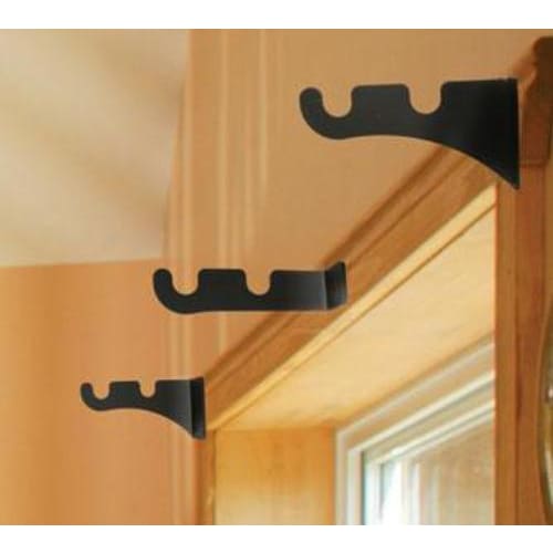 Curtain Brackets For Two 1/2 Inch Rods installed above a window frame, demonstrating dual rod support for layered curtain setups.