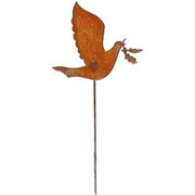 Rust-finished dove garden stake holding a holly sprig, perfect for rustic outdoor decor and seasonal garden accents.