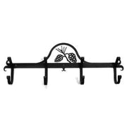 Black metal Pinecone Coat Bar featuring pinecone motif and 5 sturdy hooks, perfect for hanging coats or towels in cabin-style interiors.