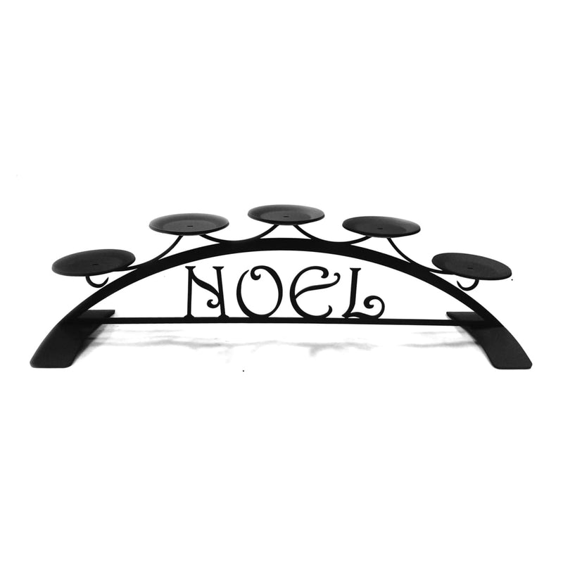 Noel Table Top Pillar Candle Holder in black metal with decorative 'NOEL' text and six round platforms for pillar candles. Ideal for festive home decor.