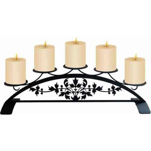 Black Victorian Table Top Pillar Candle Holder featuring five lit pillar candles and intricate floral design, perfect for vintage-style interiors.